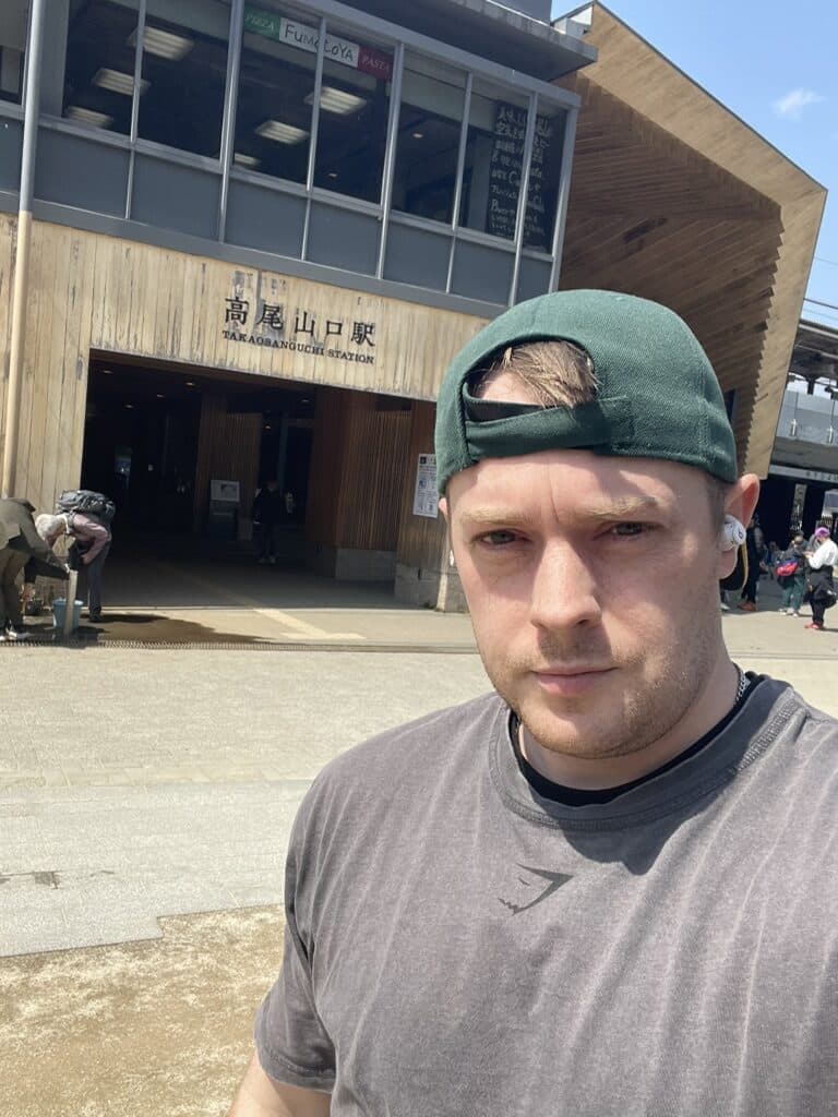 Luke outside Takaosanguchi Station, the stop at the foot of Mount Takao